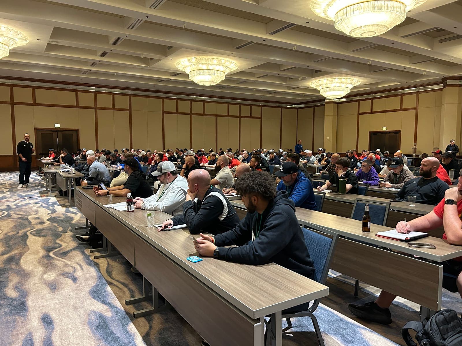 Coaches in a classroom session at a Glazier Clinics event