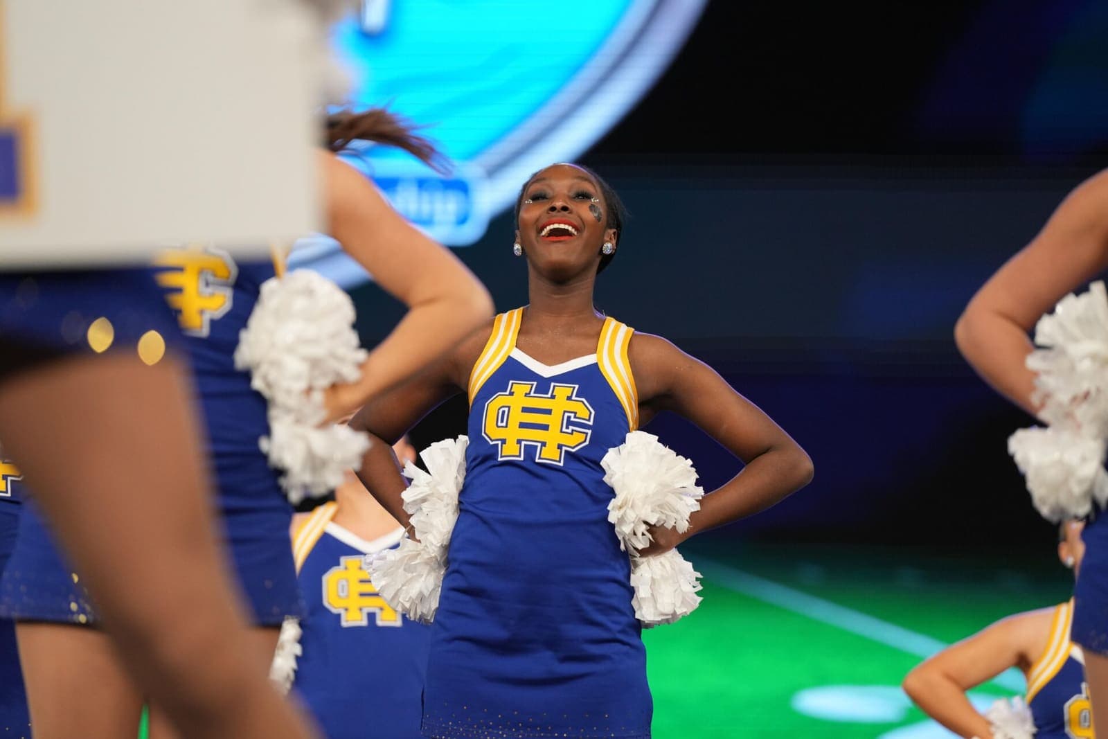 Cheerleaders on stage at a Varsity Spirit event